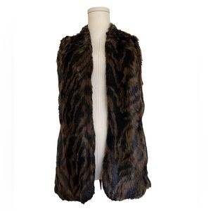Chicos faux fur vest. Size 0. Fits like a medium. Brown and back animal print.
